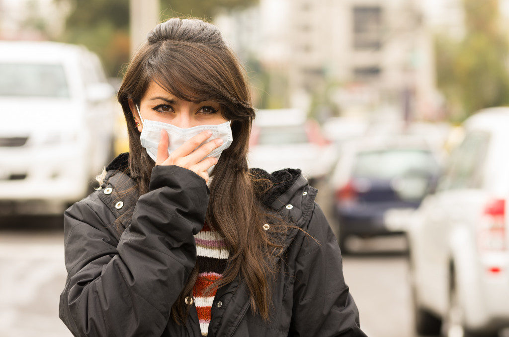 woman wearing a mask