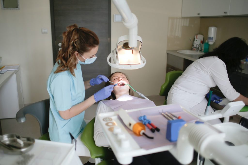 dentists working on patient
