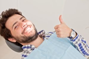 man smiling dentist