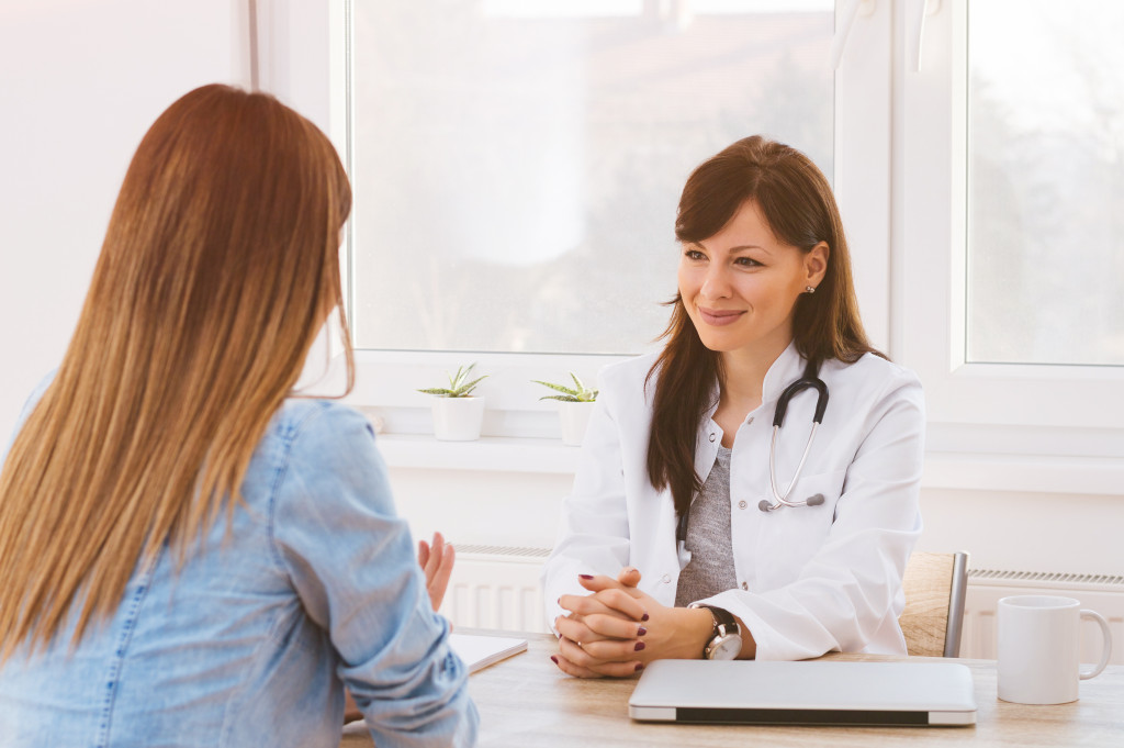 woman and doctor