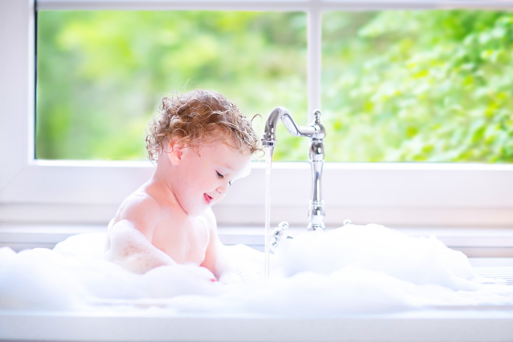 child in bath