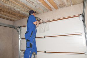 man renovating a home garage