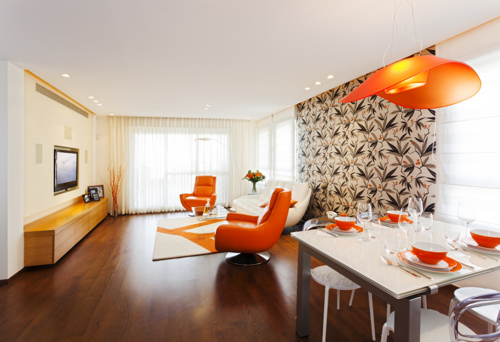 Living room with orange as the dominant color.